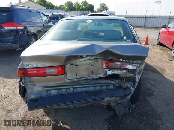 1997 Toyota Camry LE z VIN 4T1BF22K1VU025776, wystawiony jako IAAI lot #42270137 z przebiegiem 168 299 mil mil oraz . Historia ofert i sprzedaży dostępna na DreamBid. Obrazek 17.