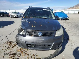 2010 Suzuki SX4 z VIN JS2YA5A35A6301406, wystawiony jako Copart lot #81810084 z przebiegiem 134 349 mil mil oraz Szkody całkowita. Historia ofert i sprzedaży dostępna na DreamBid. Obrazek 5.