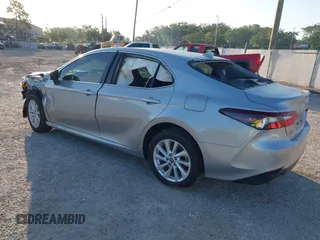 2023 Toyota Camry LE z VIN 4T1C11AK2PU125757, wystawiony jako IAAI lot #42128196 z przebiegiem 5 777 mil mil oraz . Historia ofert i sprzedaży dostępna na DreamBid. Obrazek 3.