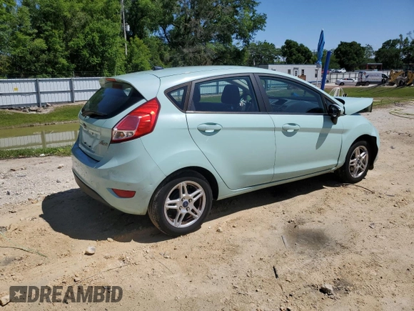 2017 Ford Fiesta SE with VIN 3FADP4EJ0HM126301, listed as a Copart auction lot 52218865 with 80,598 mi miles and Salvage Title. Bid and sale history available at DreamBid. Image 3.