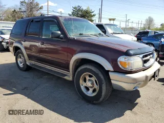 1999 Ford Explorer XLT with VIN 1FMZU34E3XUB50850, listed as a Copart auction lot 52257815 with 162,360 mi miles and Salvage title. Bid and sale history available at DreamBid. Image 4.