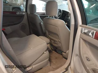 2007 Chrysler Pacifica Touring z VIN 2A8GM68X87R162765, wystawiony jako IAAI lot #42382704 z przebiegiem 160 768 mil mil oraz . Historia ofert i sprzedaży dostępna na DreamBid. Obrazek 8.