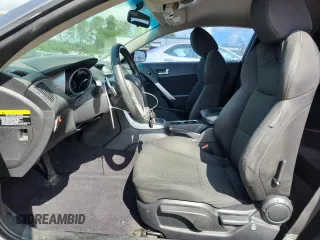 2010 Hyundai Genesis Coupe with VIN KMHHT6KD9AU028740, listed as a Copart auction lot 62997005 with 210,161 mi miles and Clean title. Bid and sale history available at DreamBid. Image 7.