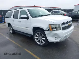 2008 Chevrolet Suburban LTZ z VIN 1GNFC16018R143195, wystawiony jako IAAI lot #41577367 z przebiegiem 223 506 mil mil oraz . Historia ofert i sprzedaży dostępna na DreamBid. Obrazek 1.