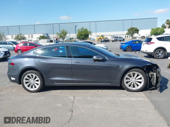 2018 Tesla Model S 75D with VIN 5YJSA1E26JF249573, listed as a IAAI auction lot 42748801 with 88,467 mi miles and . Bid and sale history available at DreamBid. Image 14.