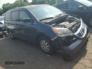 2010 Honda Odyssey EX-L z VIN 5FNRL3H73AB089714, wystawiony jako Copart lot #60276305 z przebiegiem 125 025 mil mil oraz Szkoda całkowita • Salvage title. Historia ofert i sprzedaży dostępna na DreamBid. Obrazek 4.