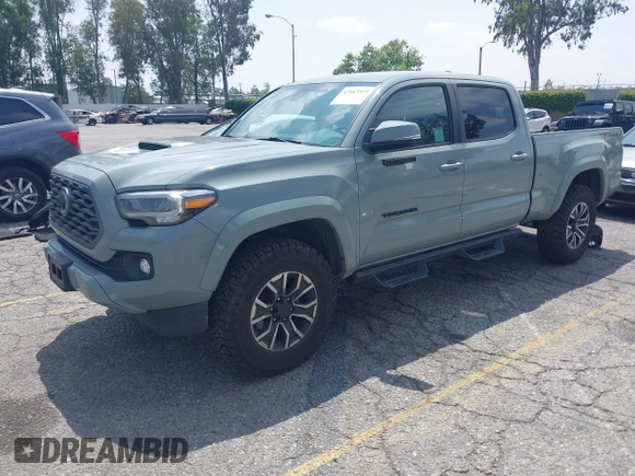 2022 Toyota Tacoma SR5 with VIN 3TMBZ5DN1NM035572, listed as a IAAI auction lot 42083925 with 82,596 mi miles and . Bid and sale history available at DreamBid. Image 20.