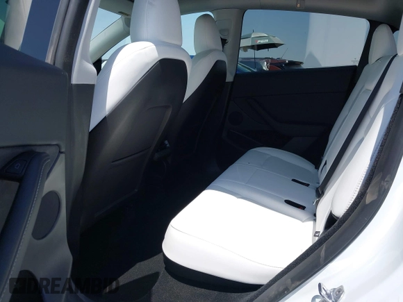 2024 Tesla Model Y with VIN 7SAYGDED8RF201955, listed as a IAAI auction lot 42700483 with 11,898 mi miles and . Bid and sale history available at DreamBid. Image 8.