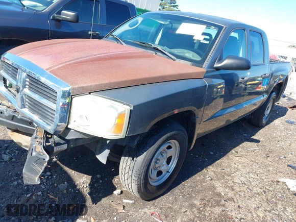 2006 Dodge Dakota ST z VIN 1D7HE28K76S560008, wystawiony jako IAAI lot #42176260 z przebiegiem 199 518 mil mil oraz . Historia ofert i sprzedaży dostępna na DreamBid. Obrazek 18.