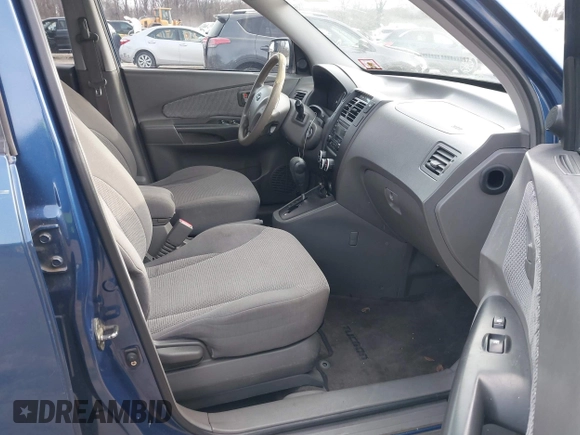 2007 Hyundai Tucson GLS with VIN KM8JM12B77U617990, listed as a IAAI auction lot 41300579 with 167,789 mi miles. Bid and sale history available at carsss.com. Image 5.