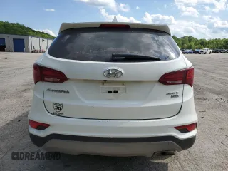 2017 Hyundai Santa Fe 2.4L z VIN 5XYZUDLB7HG388382, wystawiony jako Copart lot #57167315 z przebiegiem 128 724 mil mil oraz Szkoda całkowita • Salvage title. Historia ofert i sprzedaży dostępna na DreamBid. Obrazek 6.