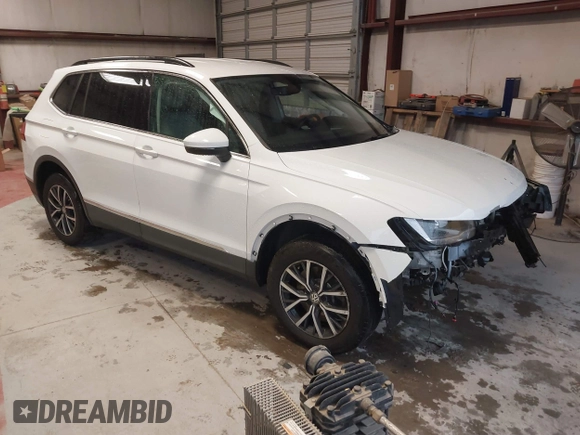 2020 Volkswagen Tiguan SE with VIN 3VV3B7AX4LM141023, listed as a IAAI auction lot 41521923 with 69,479 mi miles and . Bid and sale history available at DreamBid. Image 1.