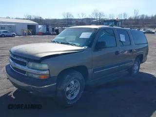 2003 Chevrolet Suburban LT z VIN 1GNFK16ZX3J197314, wystawiony jako IAAI lot #41771819 z przebiegiem 233 849 mil mil oraz . Historia ofert i sprzedaży dostępna na DreamBid. Obrazek 2.