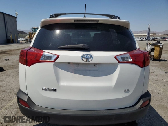 2014 Toyota RAV4 LE with VIN JTMZFREV7EJ018804, listed as a Copart auction lot 62738795 with 97,265 mi miles and Salvage title. Bid and sale history available at DreamBid. Image 6.
