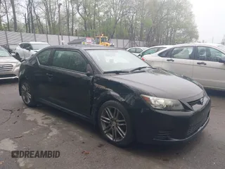 2011 Scion tC z VIN JTKJF5C79B3018581, wystawiony jako IAAI lot #42190803 z przebiegiem 108 597 mil mil oraz . Historia ofert i sprzedaży dostępna na DreamBid. Obrazek 1.