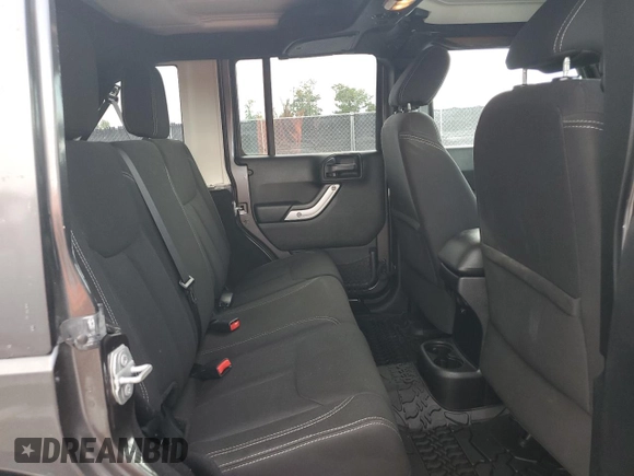 2016 Jeep Wrangler Unlimited 75th Anniversary with VIN 1C4BJWEG3GL216156, listed as a Copart auction lot 62611845 with 87,353 mi miles and Salvage title. Bid and sale history available at DreamBid. Image 11.