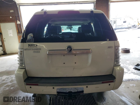 2010 Mercury Mountaineer Premier z VIN 4M2EN4JE1AUJ06924, wystawiony jako Copart lot #55436415 z przebiegiem Nie podano mil oraz Szkody całkowita. Historia ofert i sprzedaży dostępna na DreamBid. Obrazek 6.