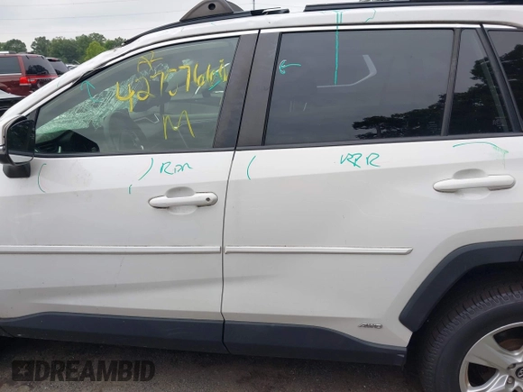 2019 Toyota RAV4 Hybrid LE with VIN JTMMWRFV9KD021285, listed as a IAAI auction lot 42757660 with 74,870 mi miles and . Bid and sale history available at DreamBid. Image 14.
