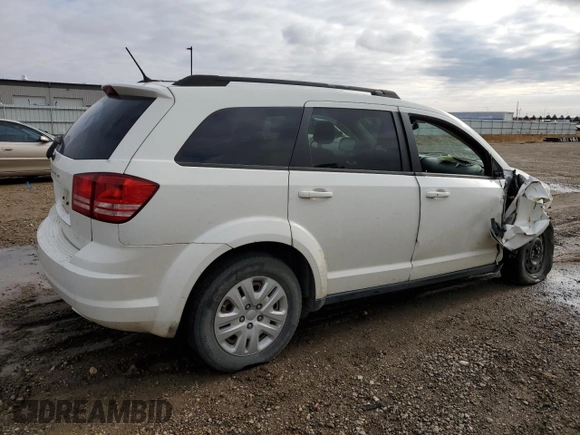 2016 Dodge Journey American Value with VIN 3C4PDCAB2GT211590, listed as a Copart auction lot 78217184 with 217,206 mi miles and Non Repairable. Bid and sale history available at DreamBid. Image 3.