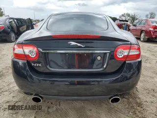 2013 Jaguar XK with VIN SAJWA4FB3DLB50331, listed as a Copart auction lot 66573384 with 109,887 mi miles and Salvage Title. Bid and sale history available at carsss.com. Image 6.