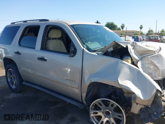 2007 Chevrolet Tahoe LS z VIN 1GNFC13C97J402723, wystawiony jako IAAI lot #42588033 z przebiegiem Nie podano mil oraz . Historia ofert i sprzedaży dostępna na DreamBid. Obrazek 14.