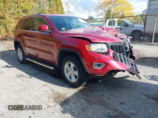 2014 Jeep Grand Cherokee Altitude with VIN 1C4RJFAG3EC477952, listed as a IAAI auction lot 40446154 with 35,573 mi miles. Bid and sale history available at carsss.com. Image 1.