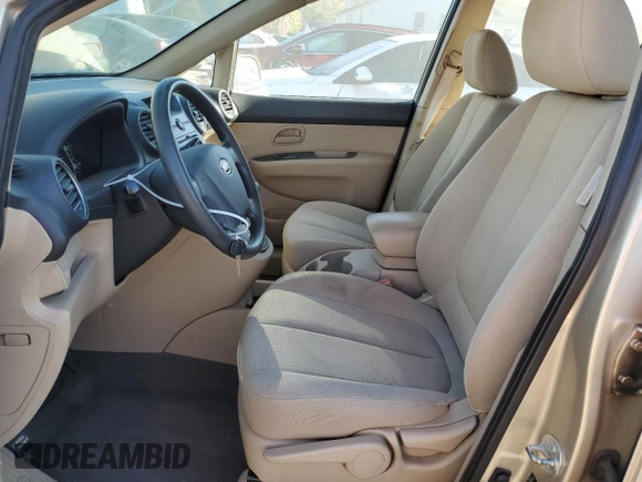 2008 Kia Rondo LX with VIN KNAFG526587163196, listed as a Copart auction lot 76804814 with 185,001 mi miles and Salvage Title. Bid and sale history available at carsss.com. Image 7.