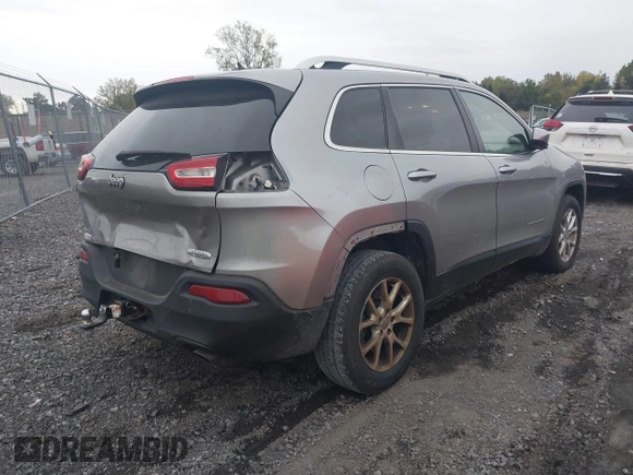 2014 Jeep Cherokee Latitude with VIN 1C4PJMCS5EW198112, listed as a IAAI auction lot 40417706 with 169,921 mi miles. Bid and sale history available at carsss.com. Image 4.