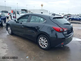 2016 Mazda Mazda3 i Grand Touring with VIN 3MZBM1N75GM267972, listed as a IAAI auction lot 41030060 with 86,065 mi miles. Bid and sale history available at carsss.com. Image 3.