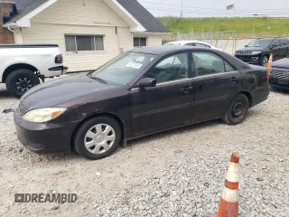 2002 Toyota Camry LE z VIN 4T1BE32K92U614076, wystawiony jako Copart lot #59273825 z przebiegiem 196 505 mil mil oraz Czysty tytuł • Clean title. Historia ofert i sprzedaży dostępna na DreamBid. Obrazek 1.