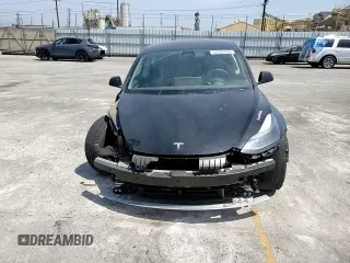 2023 Tesla Model 3 z VIN 5YJ3E1EA7PF549051, wystawiony jako Copart lot #58932765 z przebiegiem 8 800 mil mil oraz Szkoda całkowita • Salvage title. Historia ofert i sprzedaży dostępna na DreamBid. Obrazek 13.