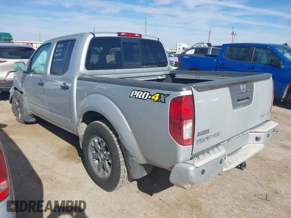 2018 Nissan Frontier SV with VIN 1N6AD0EV0JN761092, listed as a IAAI auction lot 41502701 with 103,900 mi miles and . Bid and sale history available at DreamBid. Image 3.