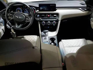 2023 Genesis G70 3.3T with VIN KMTG54TE3PU134147, listed as a Copart auction lot 61597955 with 9,863 mi miles and Salvage title. Bid and sale history available at DreamBid. Image 8.