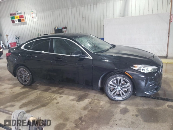 2021 BMW 2 Series 228i xDrive with VIN WBA73AK0XM7H40998, listed as a Copart auction lot 58582015 with 38,899 mi miles and Salvage title. Bid and sale history available at DreamBid. Image 4.