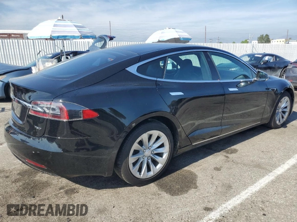 2018 Tesla Model S 75D с VIN 5YJSA1E29JF291834, выставлен на аукционе Copart как лот 55353725 с пробегом 26 871 миль миль и Списание • Salvage title. История ставок и продаж доступна на DreamBid. Изображение 3.