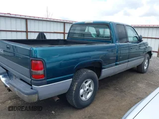 1999 Dodge 1500 z VIN 1B7HC13Z6XJ525580, wystawiony jako IAAI lot #41755940 z przebiegiem 417 640 mil mil oraz . Historia ofert i sprzedaży dostępna na DreamBid. Obrazek 4.
