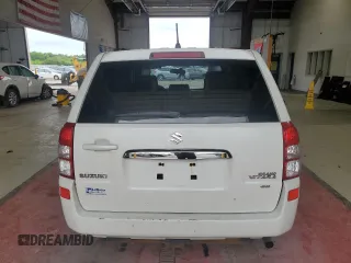2013 Suzuki Grand Vitara Premium with VIN JS3TD0D64D4100568, listed as a Copart auction lot 63958985 with 140,668 mi miles and Salvage title. Bid and sale history available at DreamBid. Image 6.
