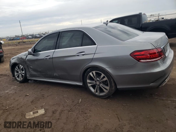2014 Mercedes-Benz E 350 Sport with VIN WDDHF5KB2EA854735, listed as a Copart auction lot 88583415 with 99,456 mi miles and Salvage title. Bid and sale history available at DreamBid. Image 2.