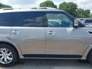 2012 Infiniti QX56 7-passenger z VIN JN8AZ2NF9C9517675, wystawiony jako IAAI lot #42138696 z przebiegiem 129 478 mil mil oraz . Historia ofert i sprzedaży dostępna na DreamBid. Obrazek 13.