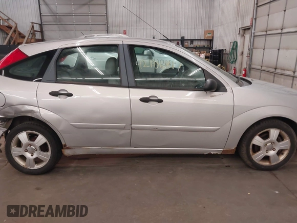 2005 Ford Focus S with VIN 3FAFP37N15R138393, listed as a IAAI auction lot 42106817 with 144,047 mi miles and . Bid and sale history available at carsss.com. Image 14.