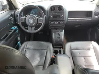 2014 Jeep Patriot Latitude z VIN 1C4NJPFA8ED679463, wystawiony jako Copart lot #57115775 z przebiegiem 183 218 mil mil oraz Szkoda całkowita • Salvage title. Historia ofert i sprzedaży dostępna na DreamBid. Obrazek 8.