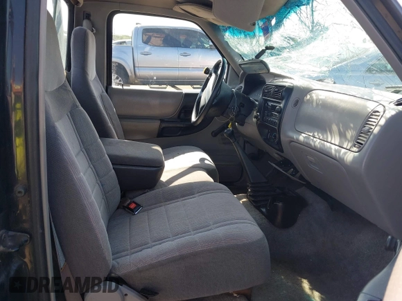 1997 Ford Ranger XLT z VIN 1FTCR10A4VTA44803, wystawiony jako IAAI lot #42479081 z przebiegiem 162 346 mil mil oraz . Historia ofert i sprzedaży dostępna na DreamBid. Obrazek 5.