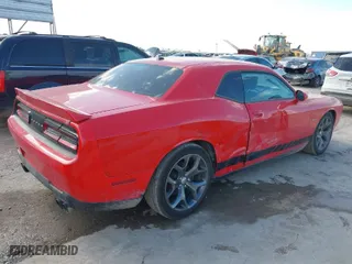 2015 Dodge Challenger R/T with VIN 2C3CDZAT2FH911390, listed as a IAAI auction lot 40882976 with 102,028 mi miles. Bid and sale history available at carsss.com. Image 4.