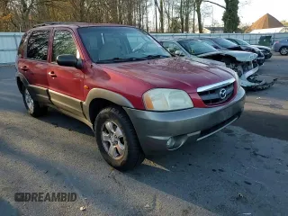 2001 Mazda Tribute LX with VIN 4F2CU08111KM19933, listed as a Copart auction lot 81174614 with 209,736 mi miles and Salvage Title. Bid and sale history available at DreamBid. Image 12.