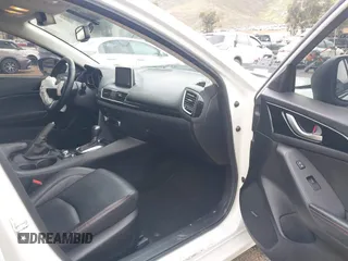 2014 Mazda 3 i Grand Touring with VIN JM1BM1M78E1208462, listed as a IAAI auction lot 41774218 with 82,781 mi miles and . Bid and sale history available at DreamBid. Image 5.