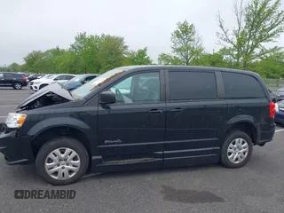 2018 Dodge Grand Caravan SE with VIN 2C7WDGBG5JR190468, listed as a IAAI auction lot 42173227 with 49,451 mi miles and . Bid and sale history available at DreamBid. Image 14.
