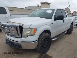 2009 Ford F-150 STX with VIN 1FTRX12819FA25009, listed as a IAAI auction lot 41468579 with 161,763 mi miles. Bid and sale history available at carsss.com. Image 2.