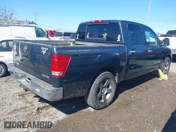 2005 Nissan Titan XE with VIN 1N6AA07A65N512479, listed as a IAAI auction lot 41659482 with 225,037 mi miles and . Bid and sale history available at DreamBid. Image 4.