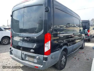 2015 Ford Transit Cargo Van with VIN 1FTYR2CM4FKA73033, listed as a IAAI auction lot 42000319 with 88,001 mi miles. Bid and sale history available at carsss.com. Image 4.