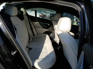 2024 BMW 5 Series 530i with VIN WBA43FJ06RCP88933, listed as a Copart auction lot 77122854 with 10,914 mi miles and Salvage Title. Bid and sale history available at carsss.com. Image 10.